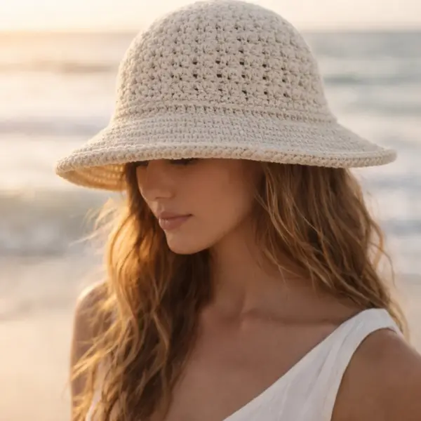 Crochet bucket hat pattern PDF showing baby and toddler sizes with I-cord ties
