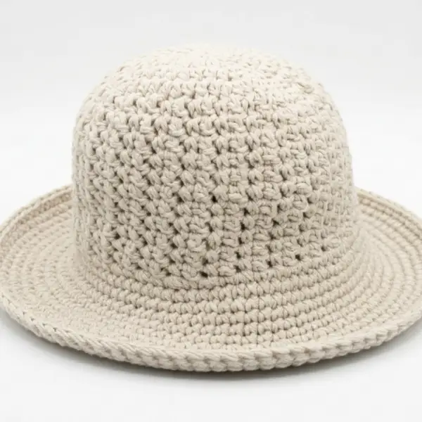 Close-up of alternating single and double crochet stitch texture on cotton bucket hat